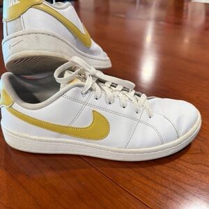 Nike Women’s White and Gold Sneakers